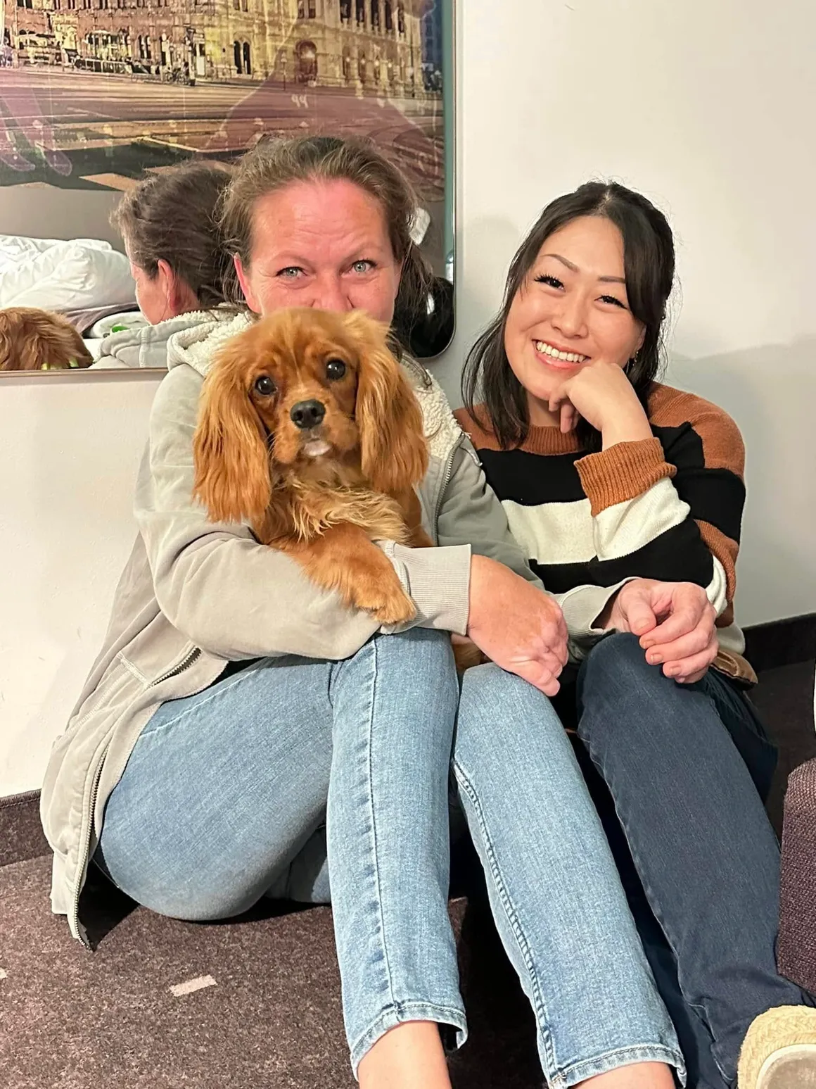 Pet owners with their Cavalier King Charles Spaniel